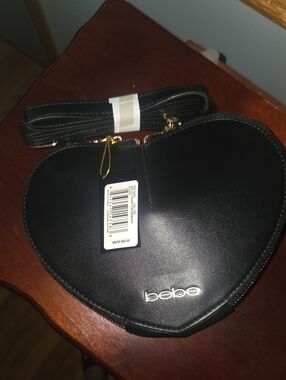 bebe Black Heart-Shaped Crossbody Bag with Gold Logo